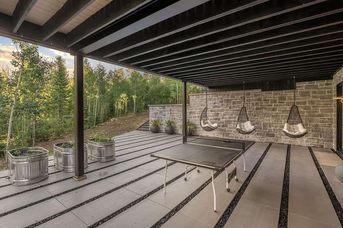 scandinavian mountain home exterior covered patio