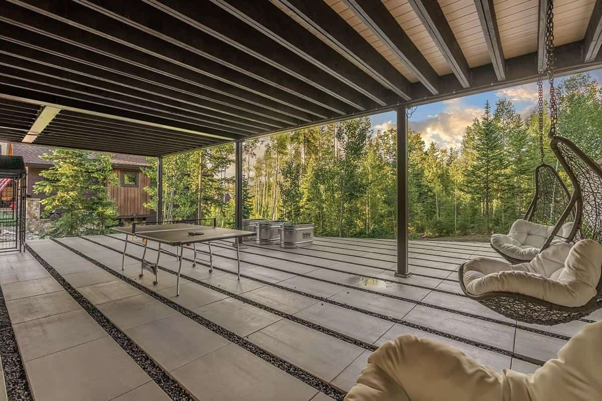 scandinavian mountain home exterior covered patio