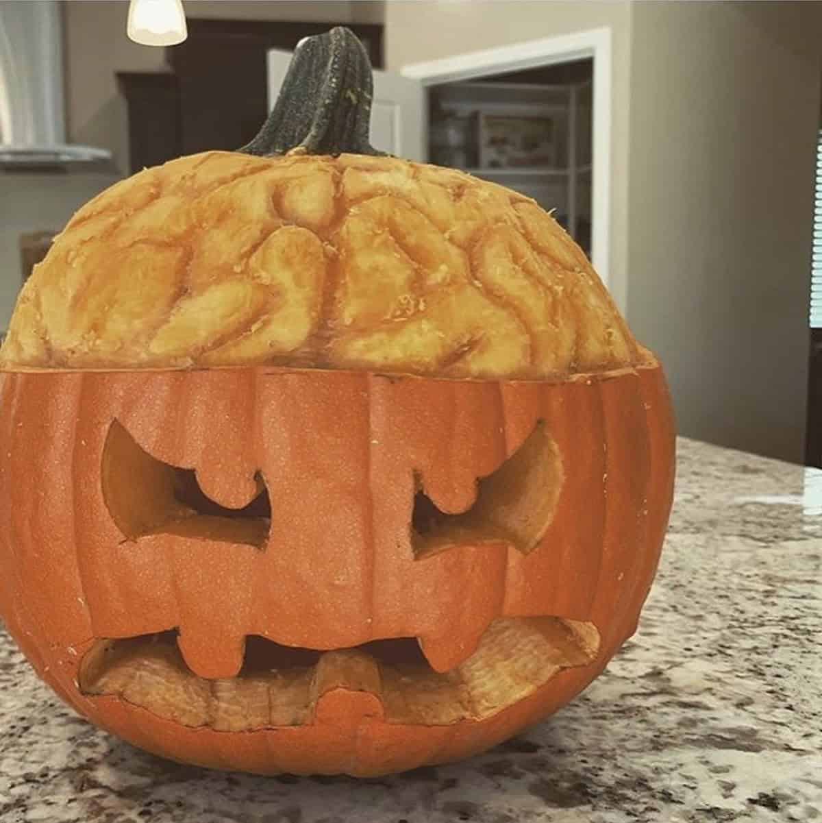carved pumpkin brain zombie for halloween decor
