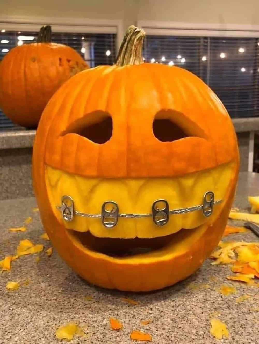 halloween carved pumpkin with braces