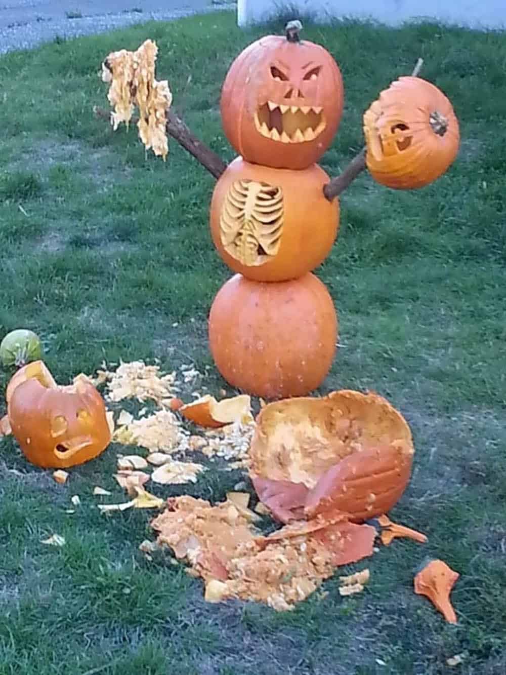 smashing pumpkins on the front yard for halloween