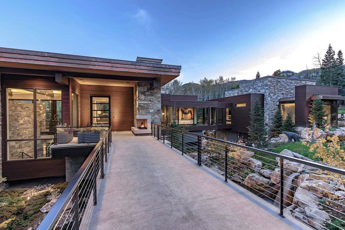 contemporary home exterior with a long driveway