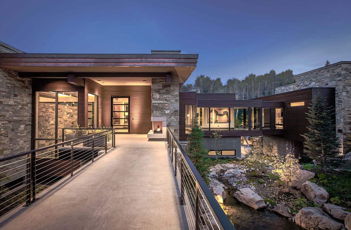 contemporary home exterior with a long driveway