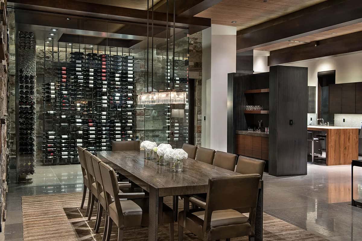 contemporary dining room with a wine cellar
