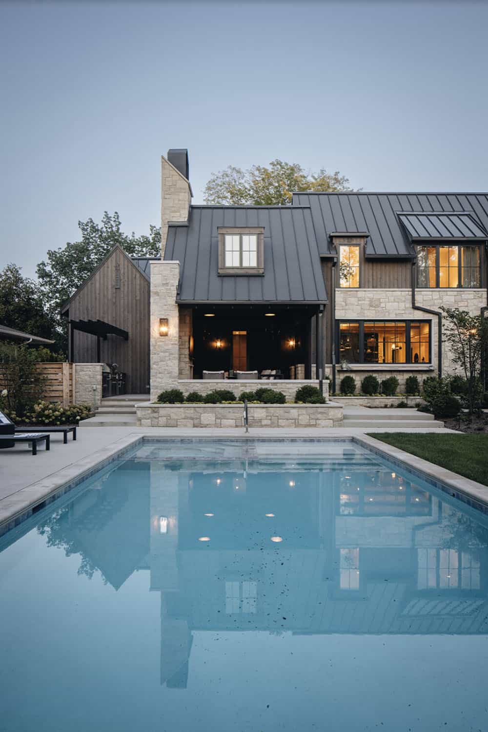 Transitional Style Home Exterior with a pool