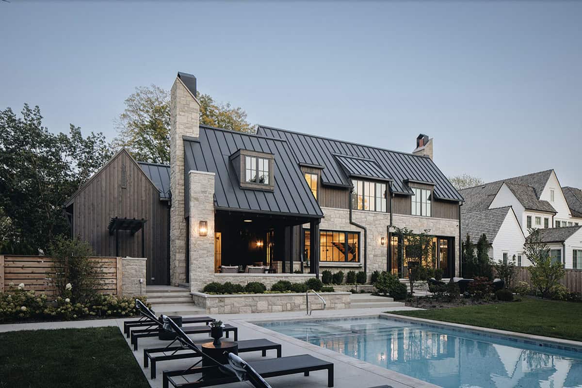 Transitional Style Home Exterior with a pool