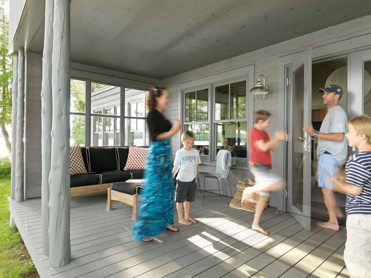 lake house exterior with a covered porch