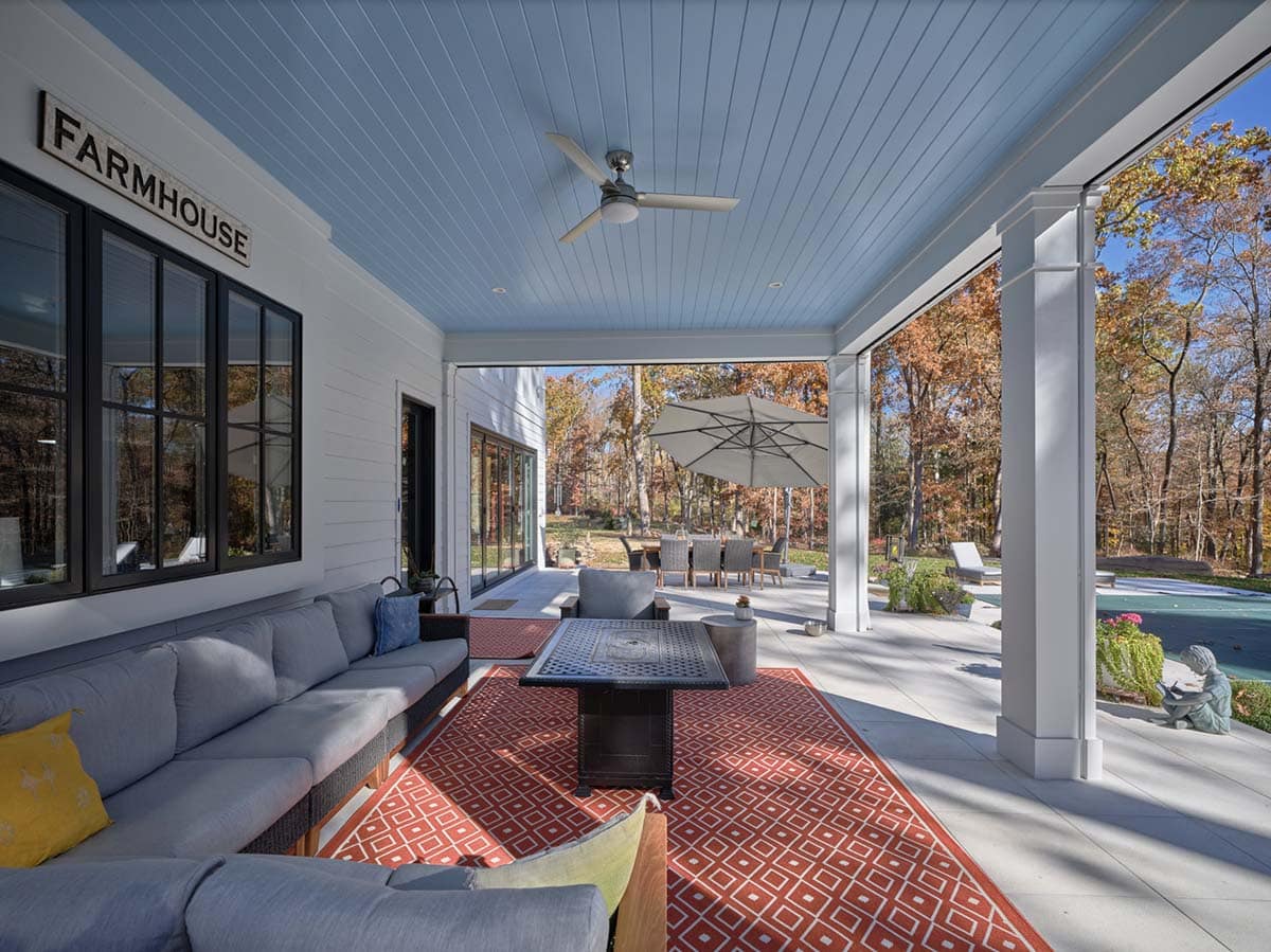 farmhouse style home covered patio