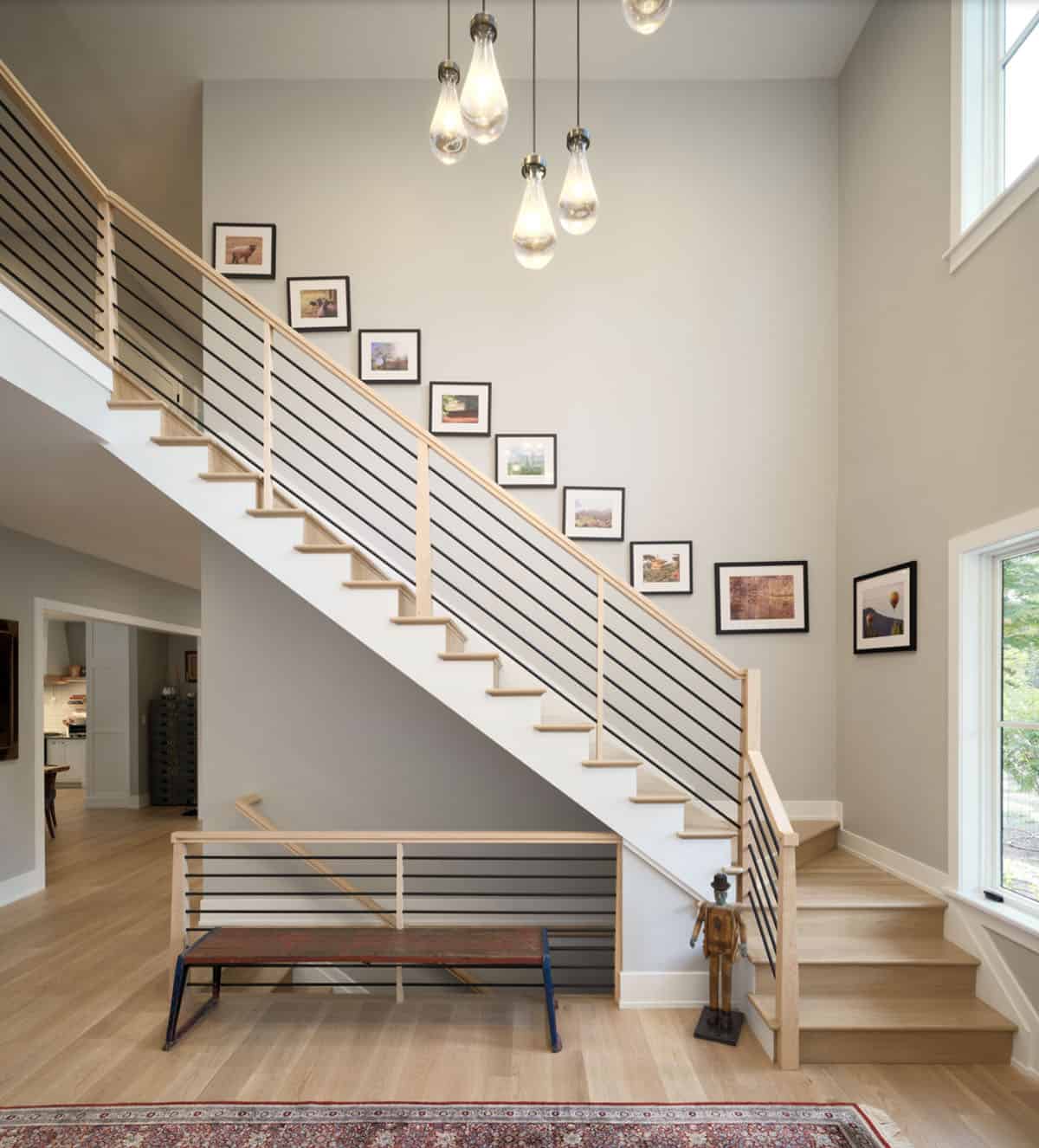 farmhouse style home entry with a staircase