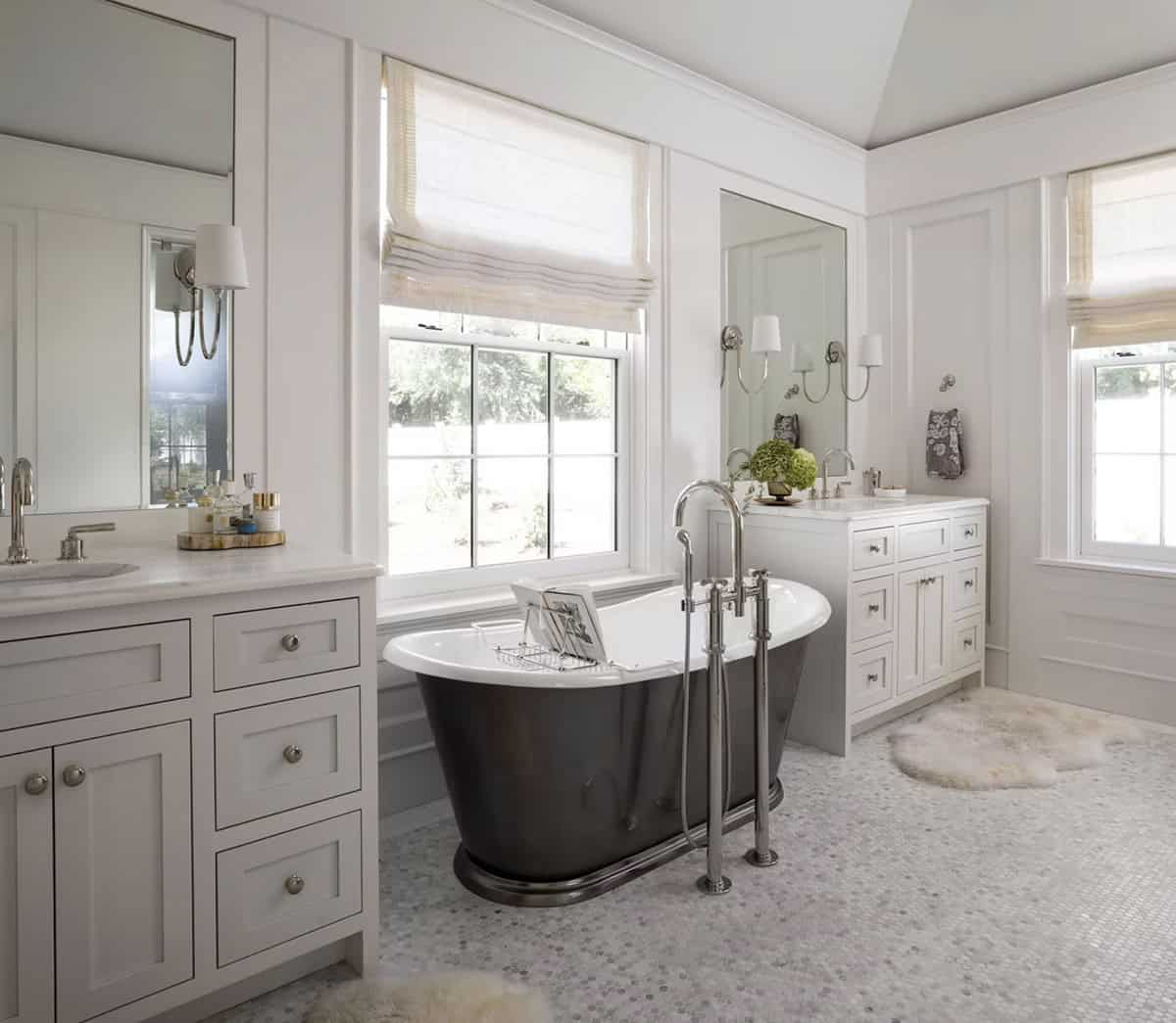 coastal style bathroom with a freestanding tub