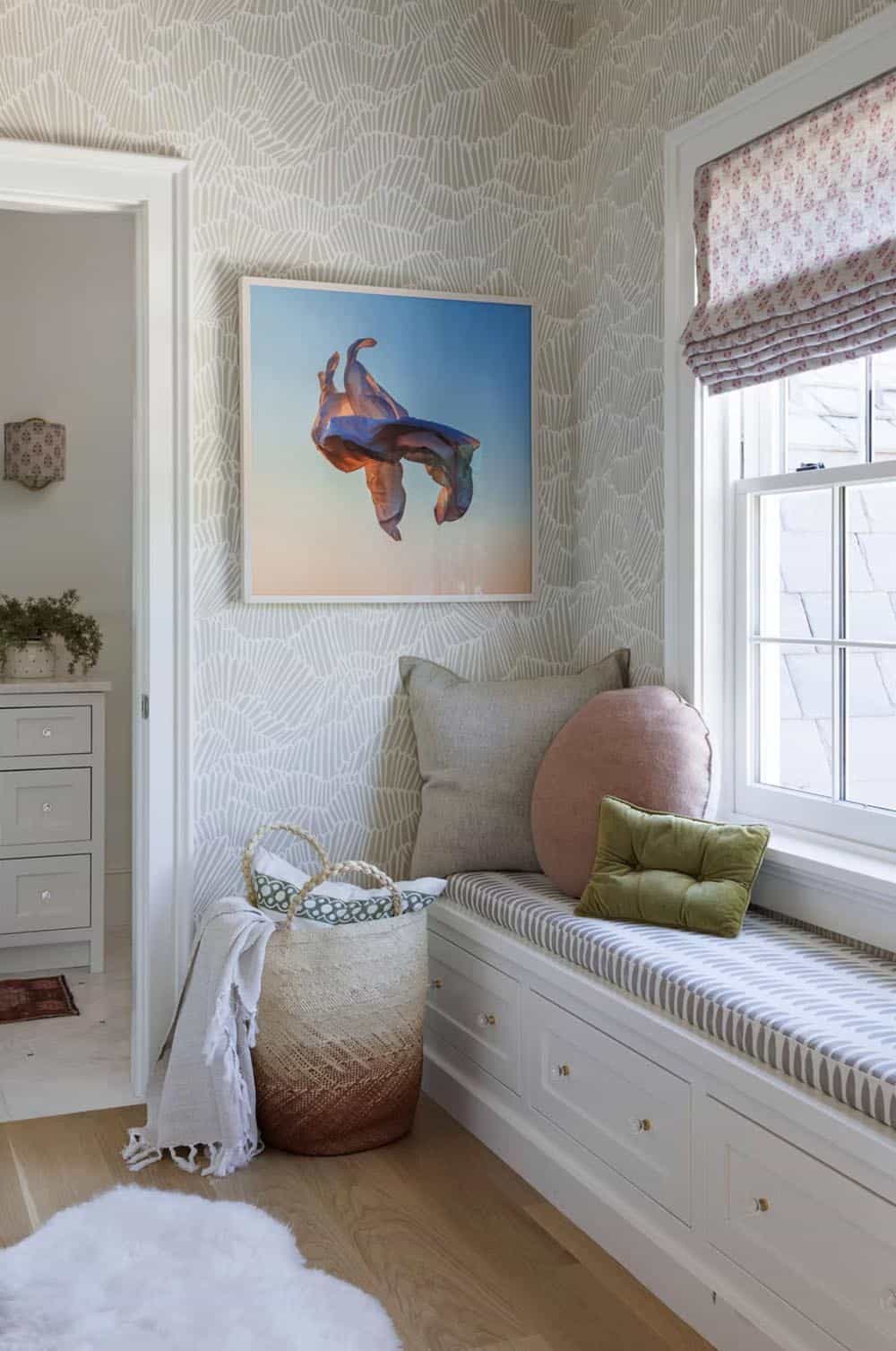 coastal style bedroom with a built-in window seat