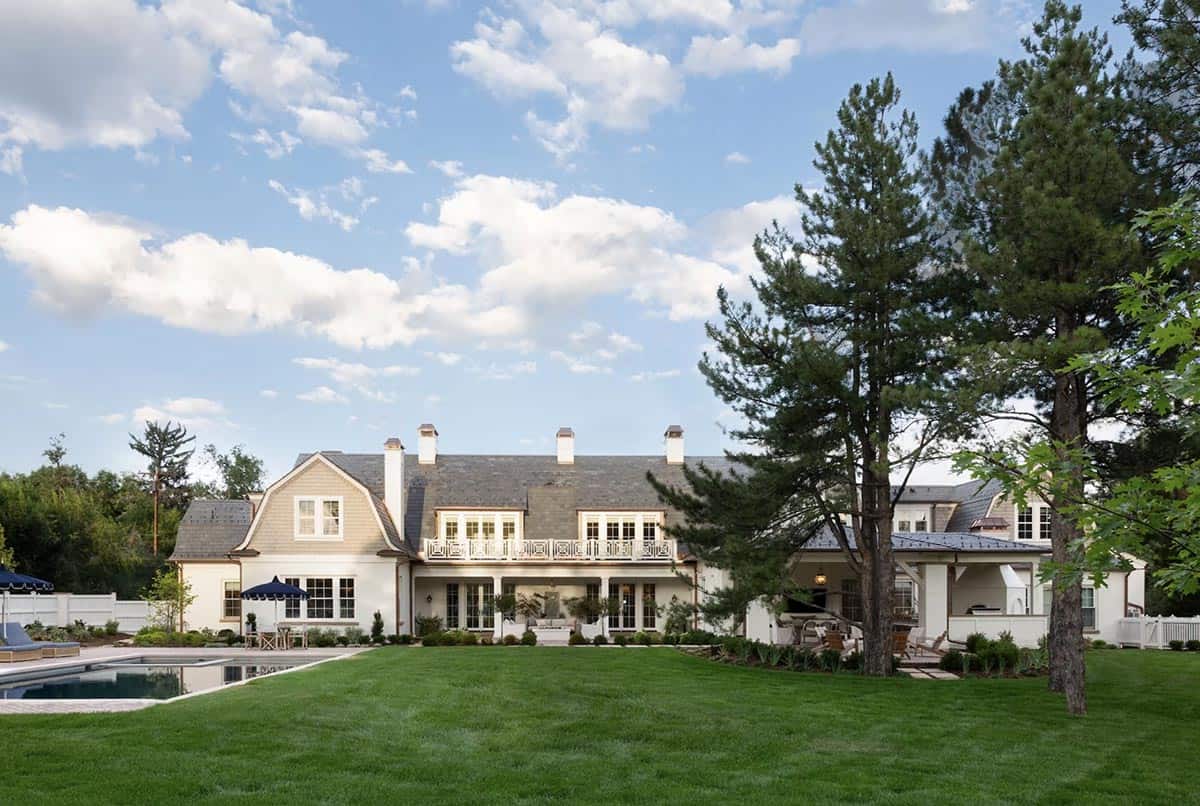 cape-cod inspired home exterior backyard