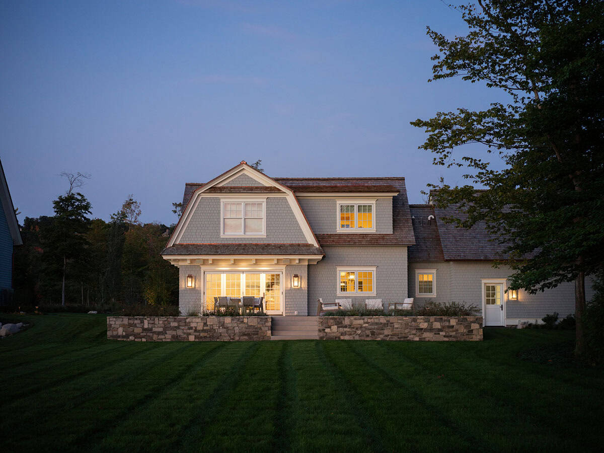contemporary guest house exterior at dusk