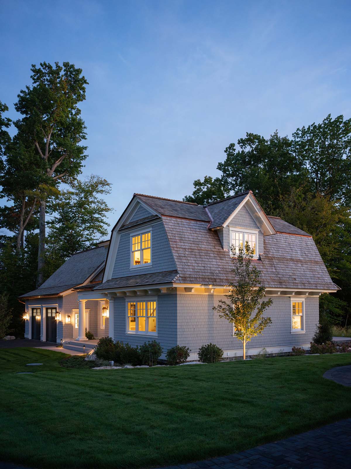 contemporary guest house exterior at dusk