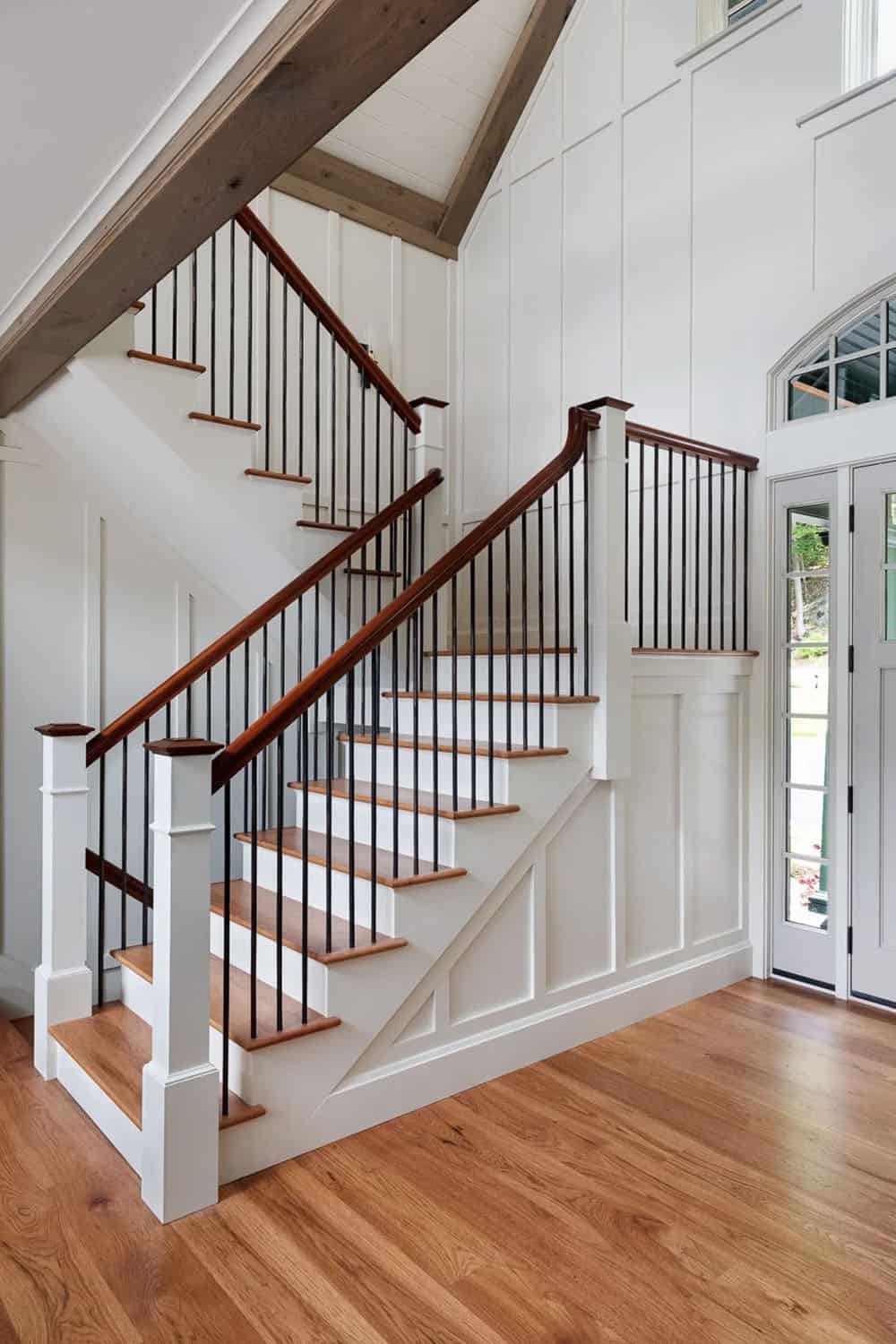 contemporary lake house entry with a staircase