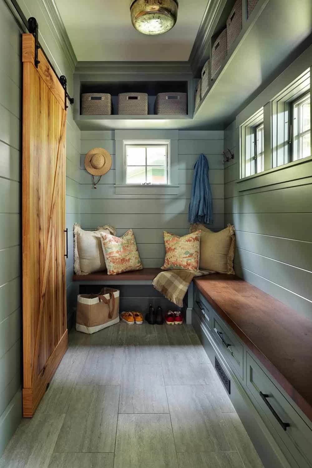 contemporary mudroom with a built-in bench