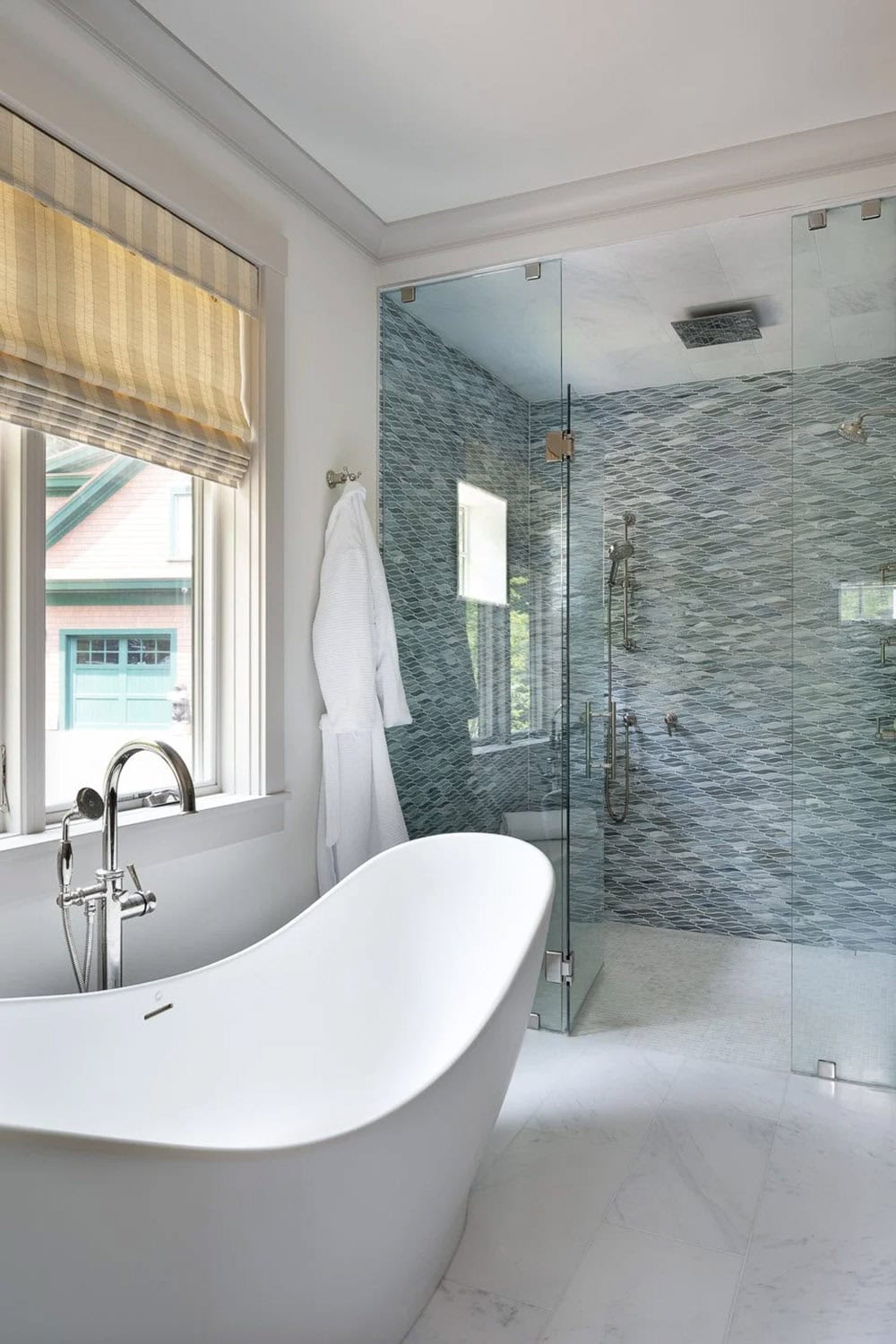 contemporary bathroom with a shower and freestanding tub