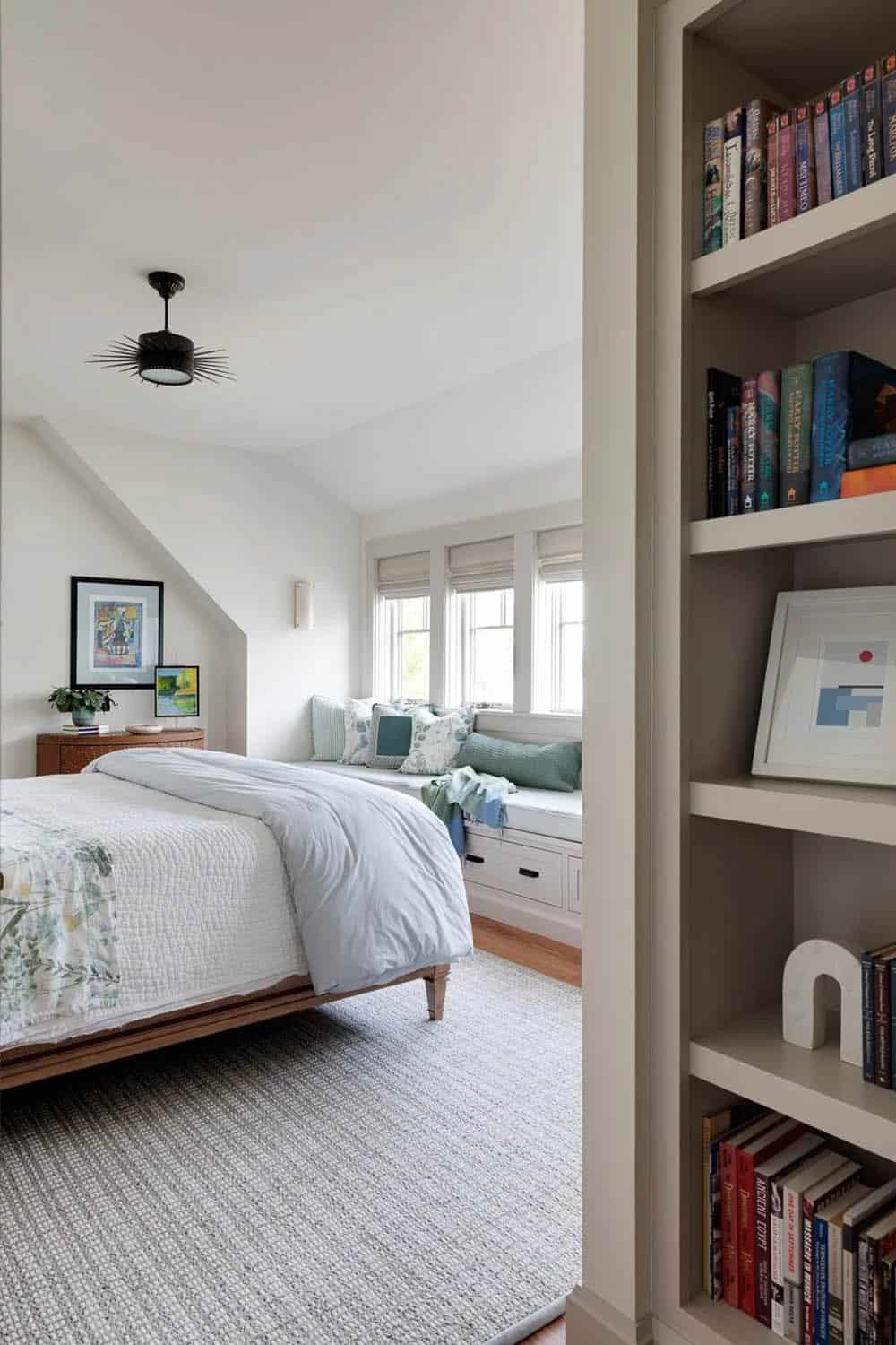 contemporary bedroom with a built-in window seat