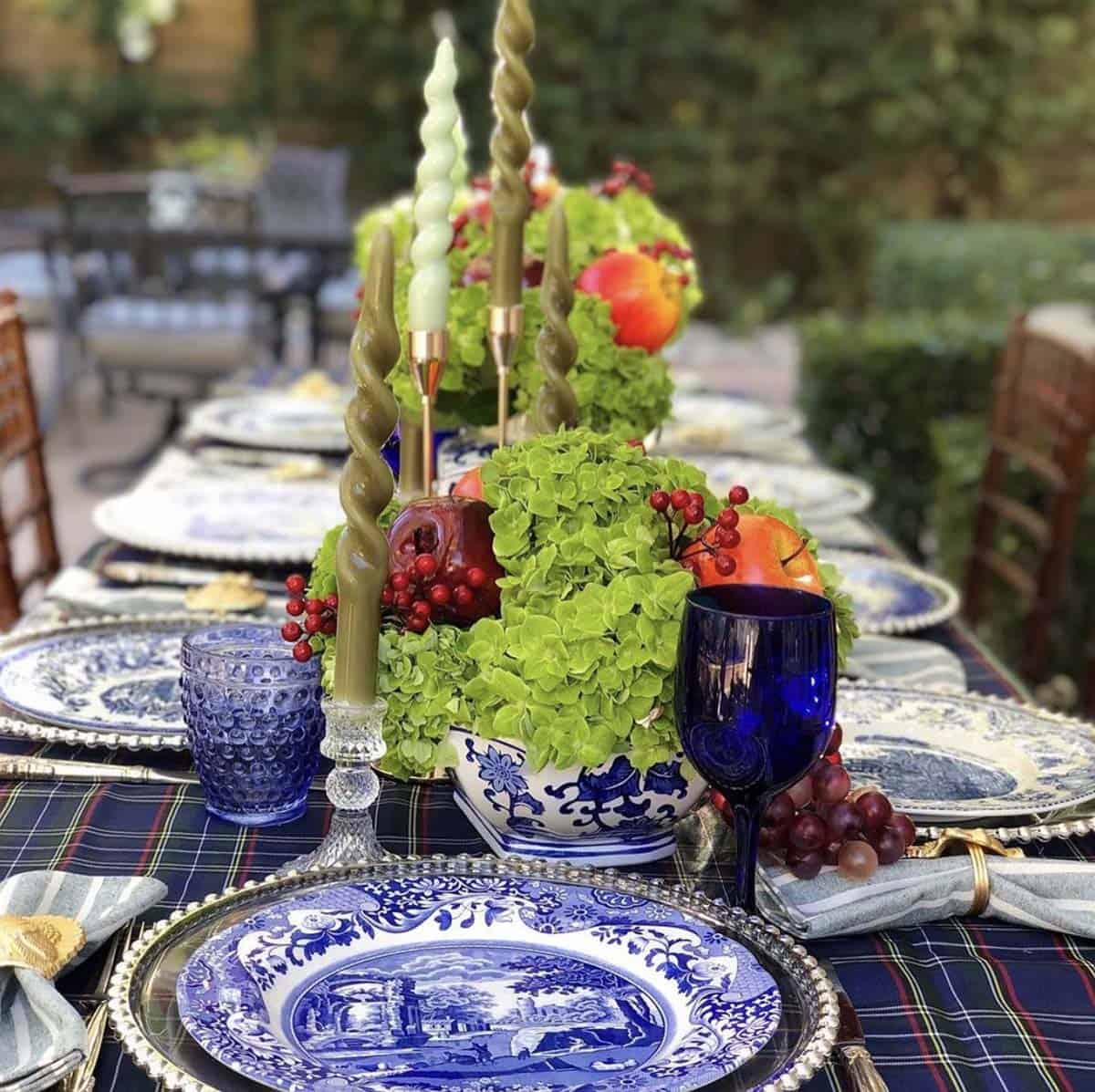 al fresco thanksgiving table with a blue and white color palette