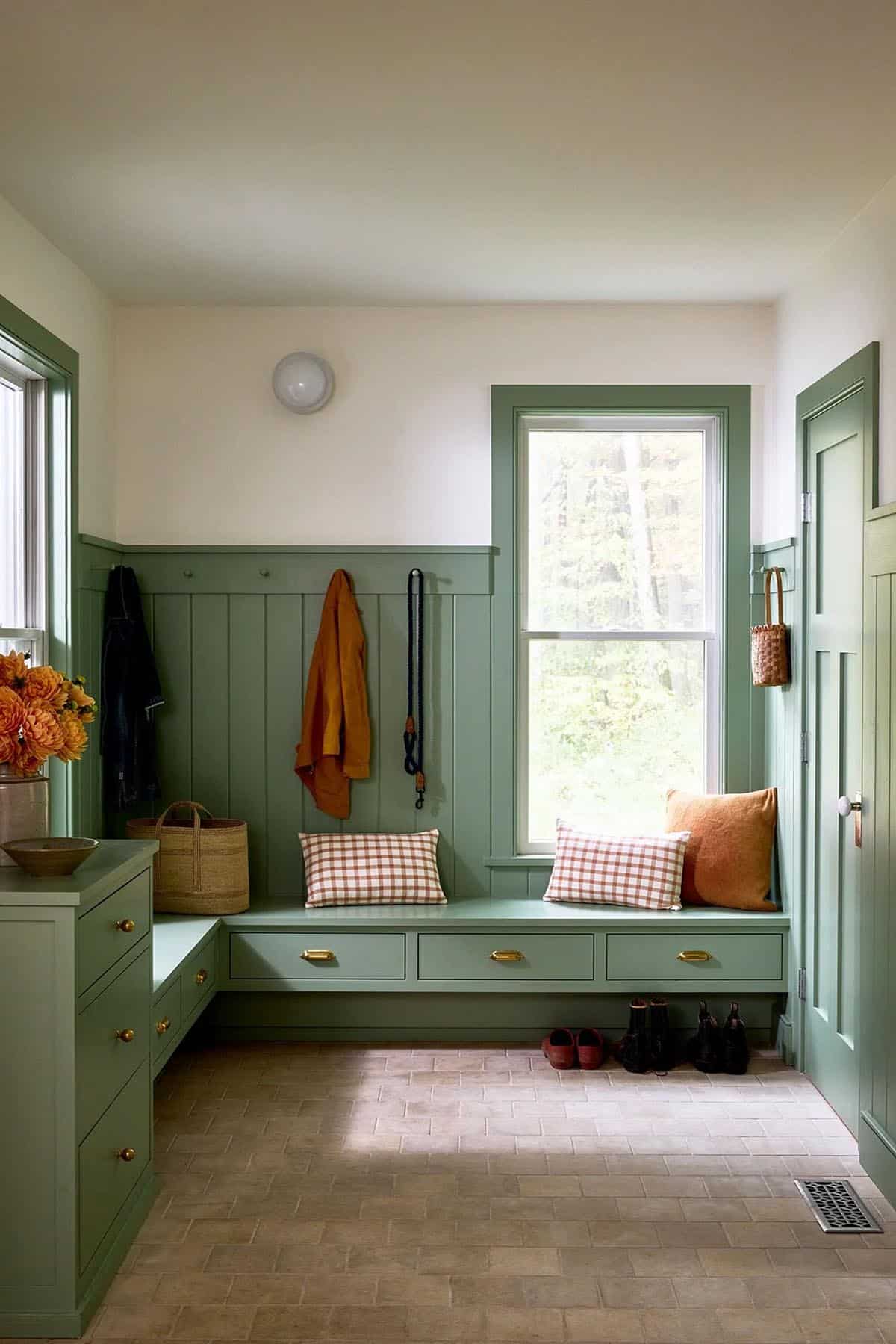 farmhouse style mudroom entry with built-in bench seating