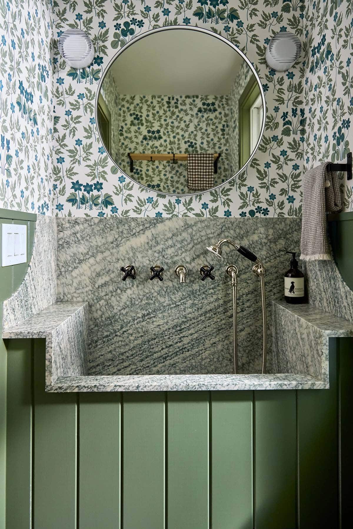 farmhouse style mud room sink with a dog wash station