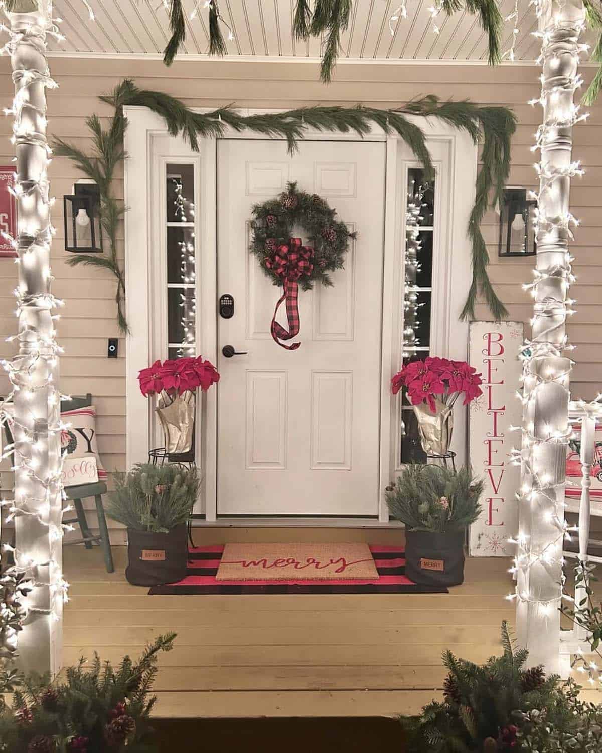 christmas decorated front porch with string lights