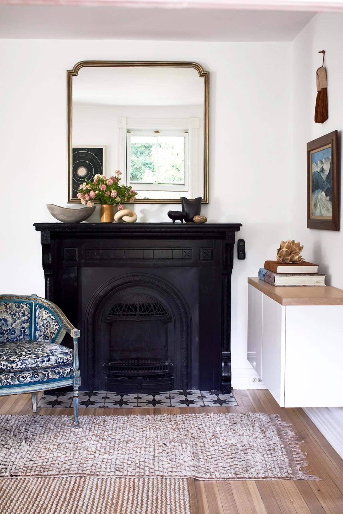 farmhouse style living room with a fireplace