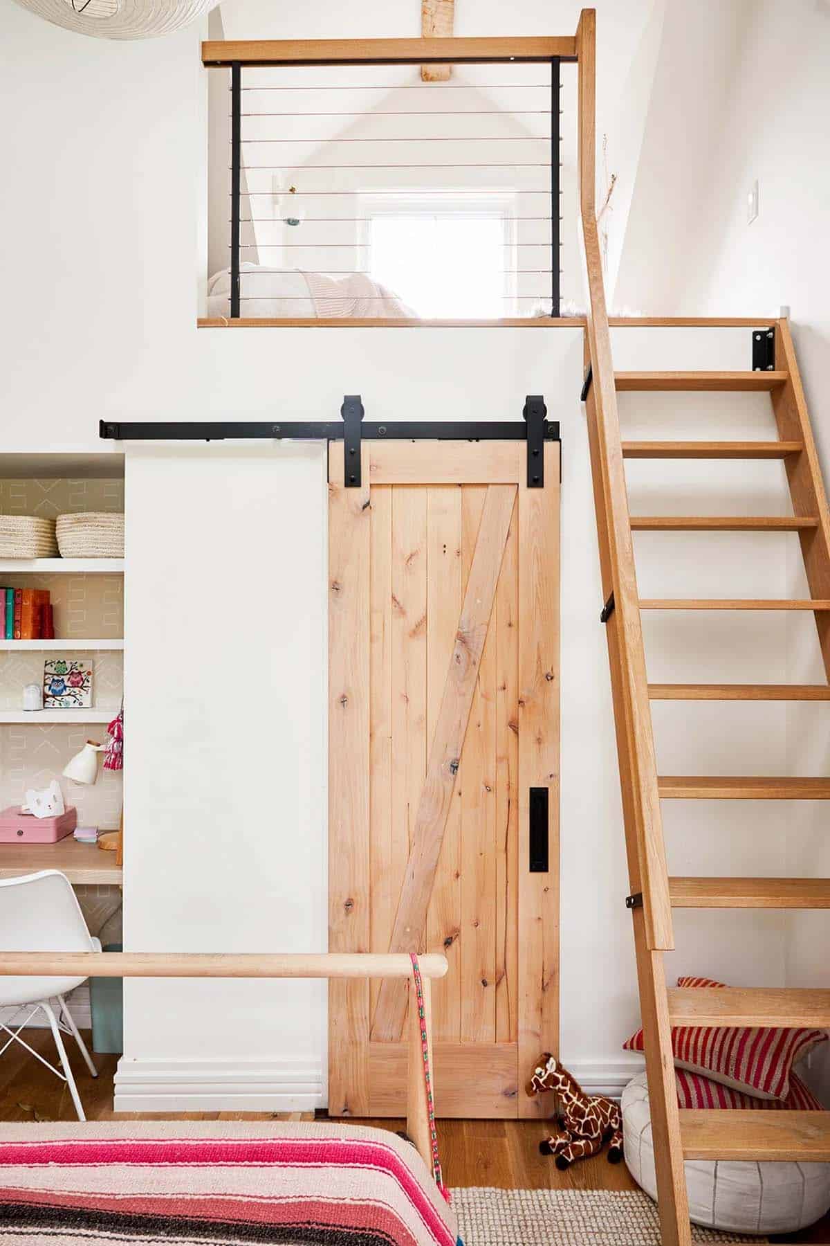 farmhouse style kids' bedroom with a loft
