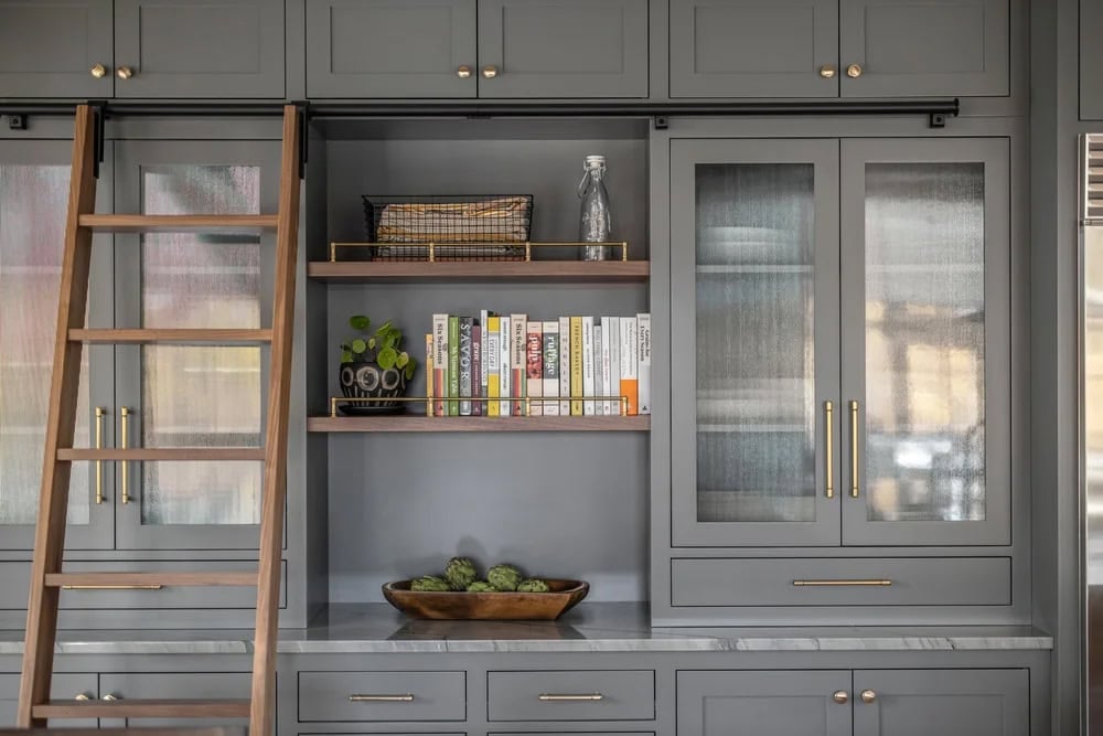 farmhouse style kitchen with a rolling ladder