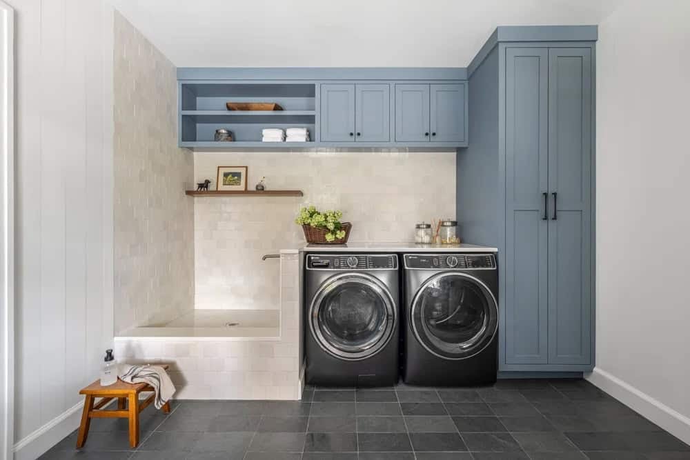 farmhouse style laundry room with a dog wash station