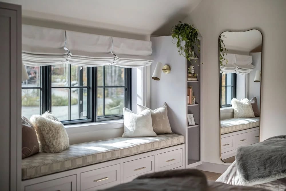 farmhouse style bedroom with a built-in window seat