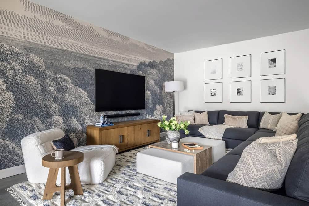 farmhouse style family room with a mural accent wall