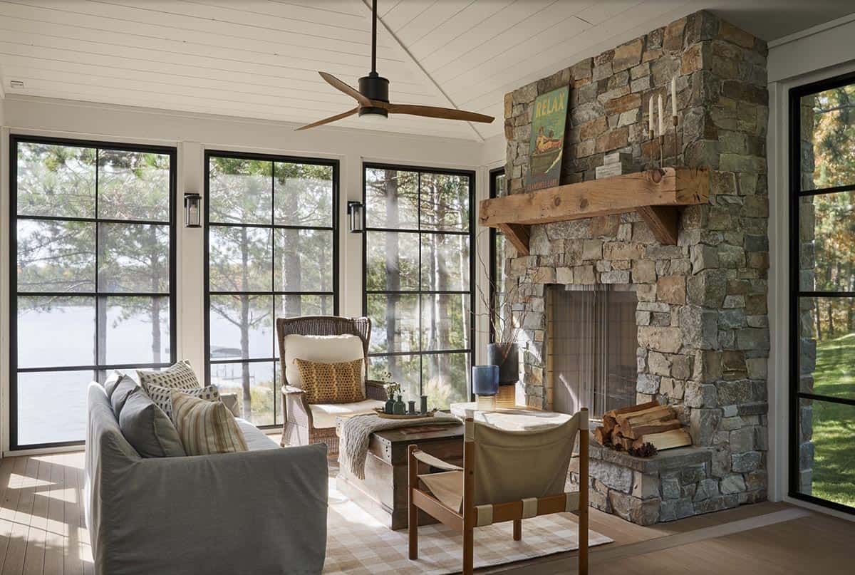 three-season sunroom porch with a fireplace
