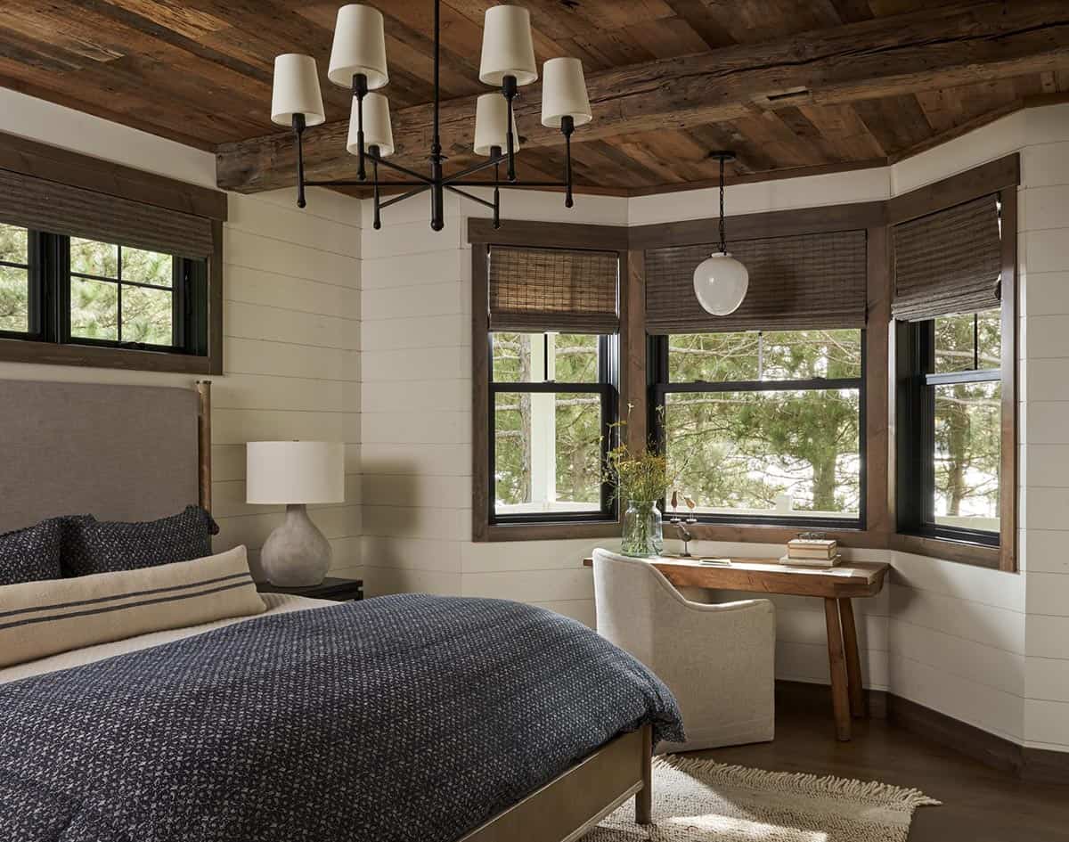 rustic bedroom with lake views