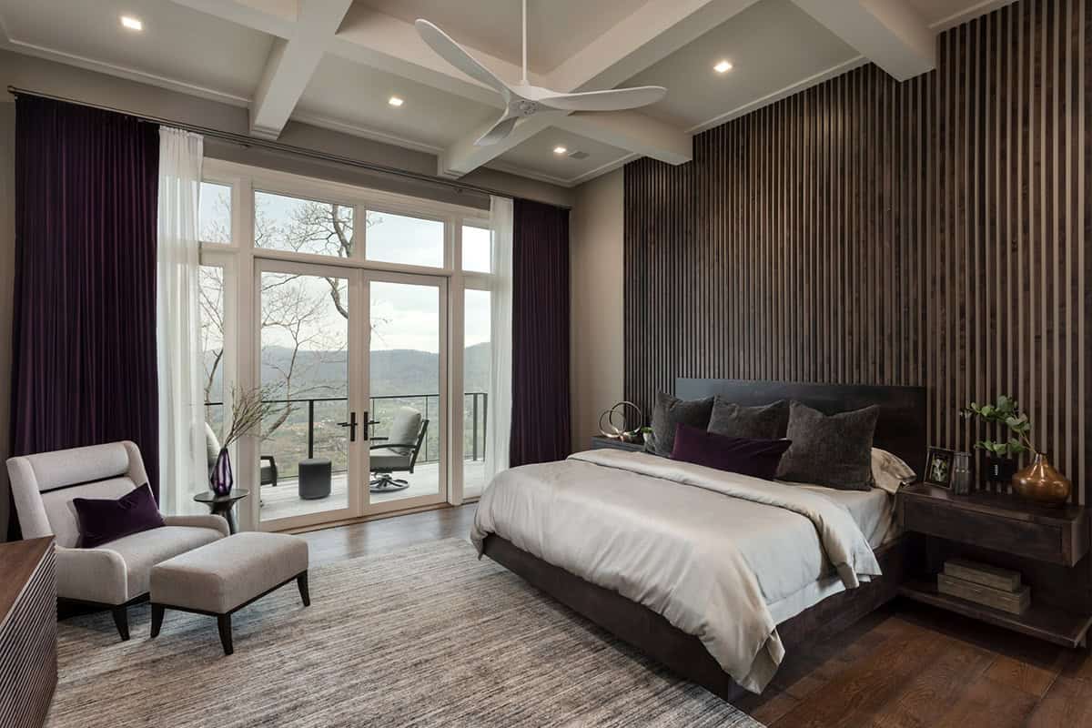 modern bedroom with floor-to-ceiling windows