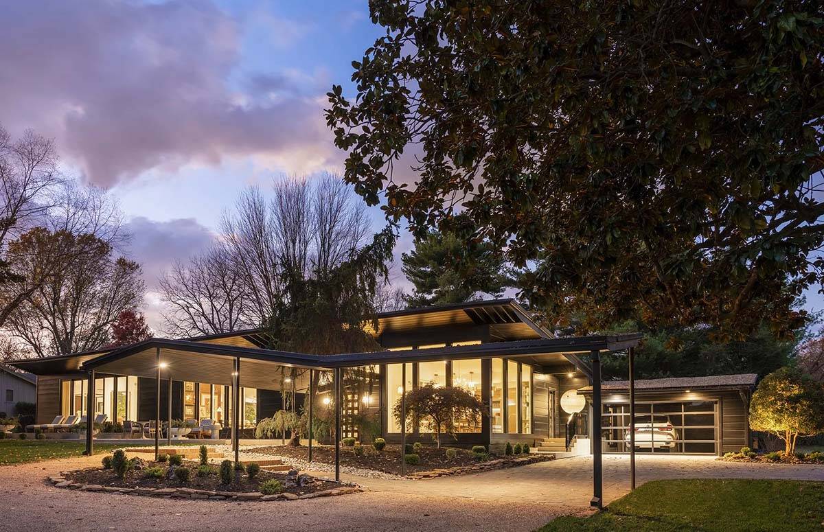 mid-century modern home exterior at dusk