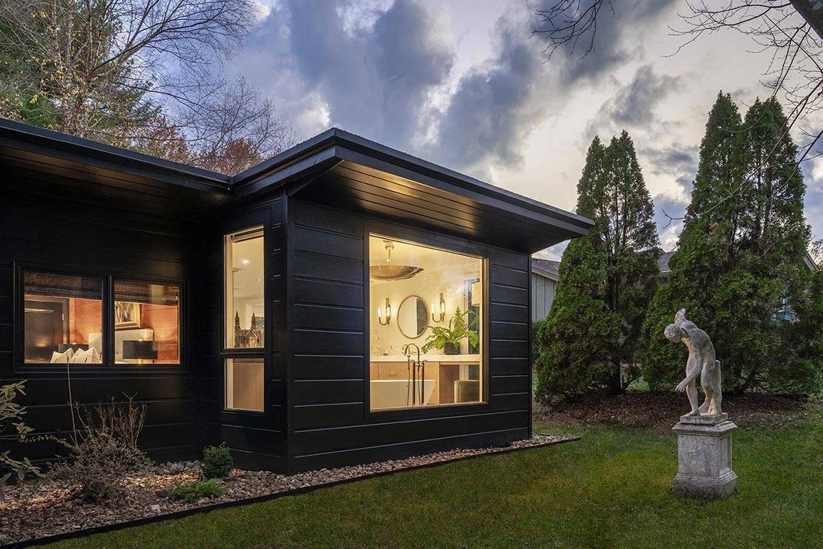 mid-century modern home exterior at dusk