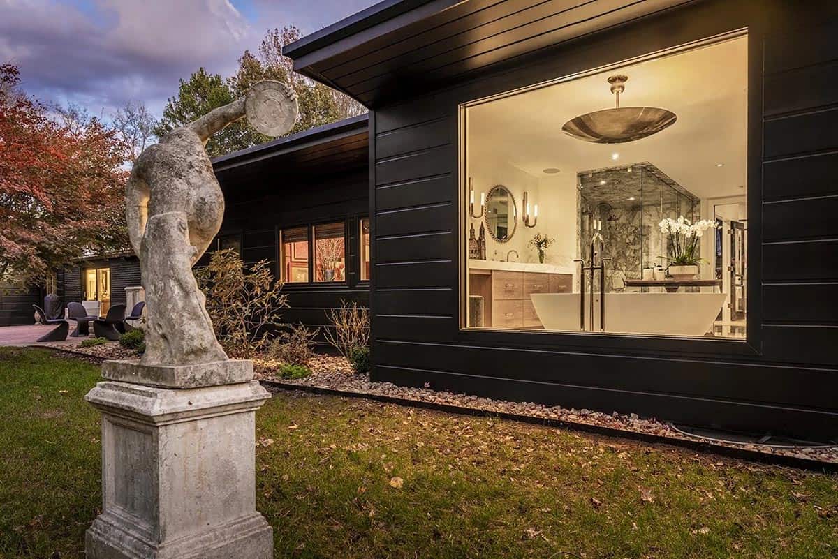 mid-century modern home exterior at dusk