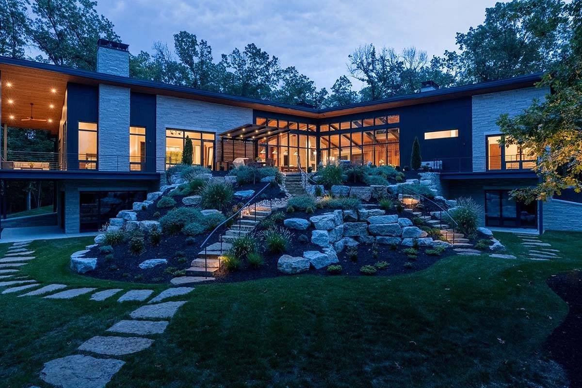 midcentury modern home exterior at dusk