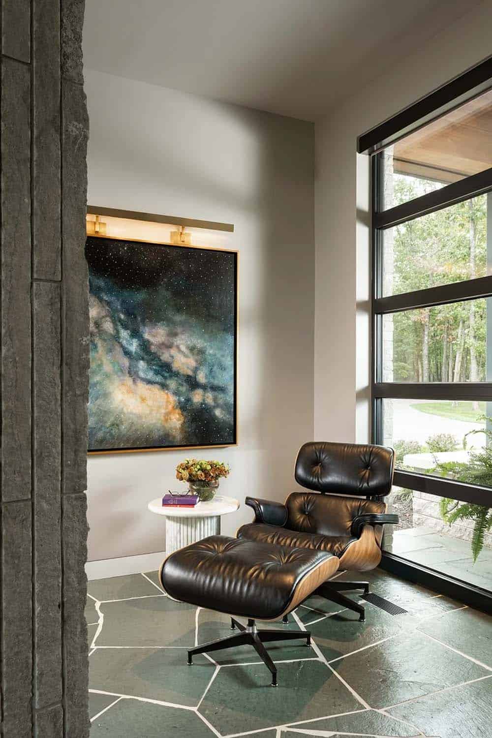 midcentury modern entry with an eames chair