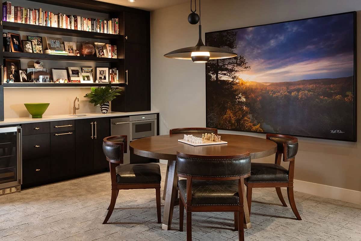 midcentury modern lower-level wet bar and table with chairs