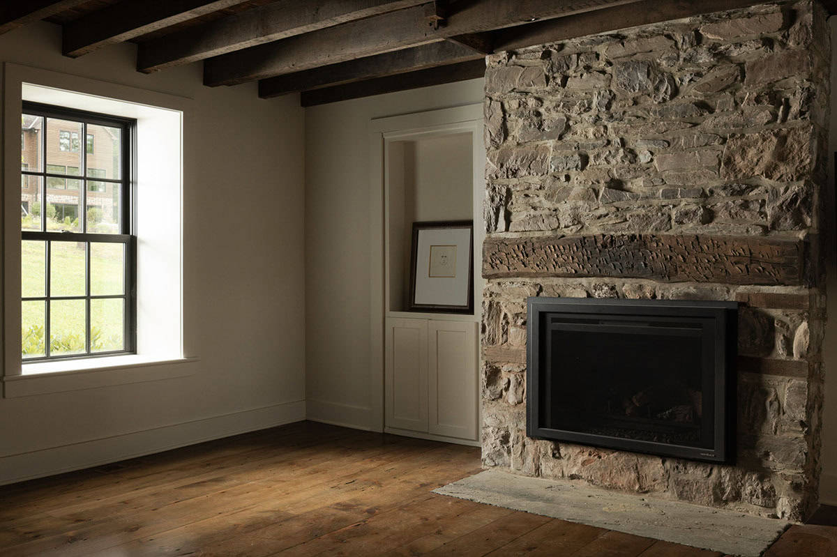 farmhouse living room with a fireplace