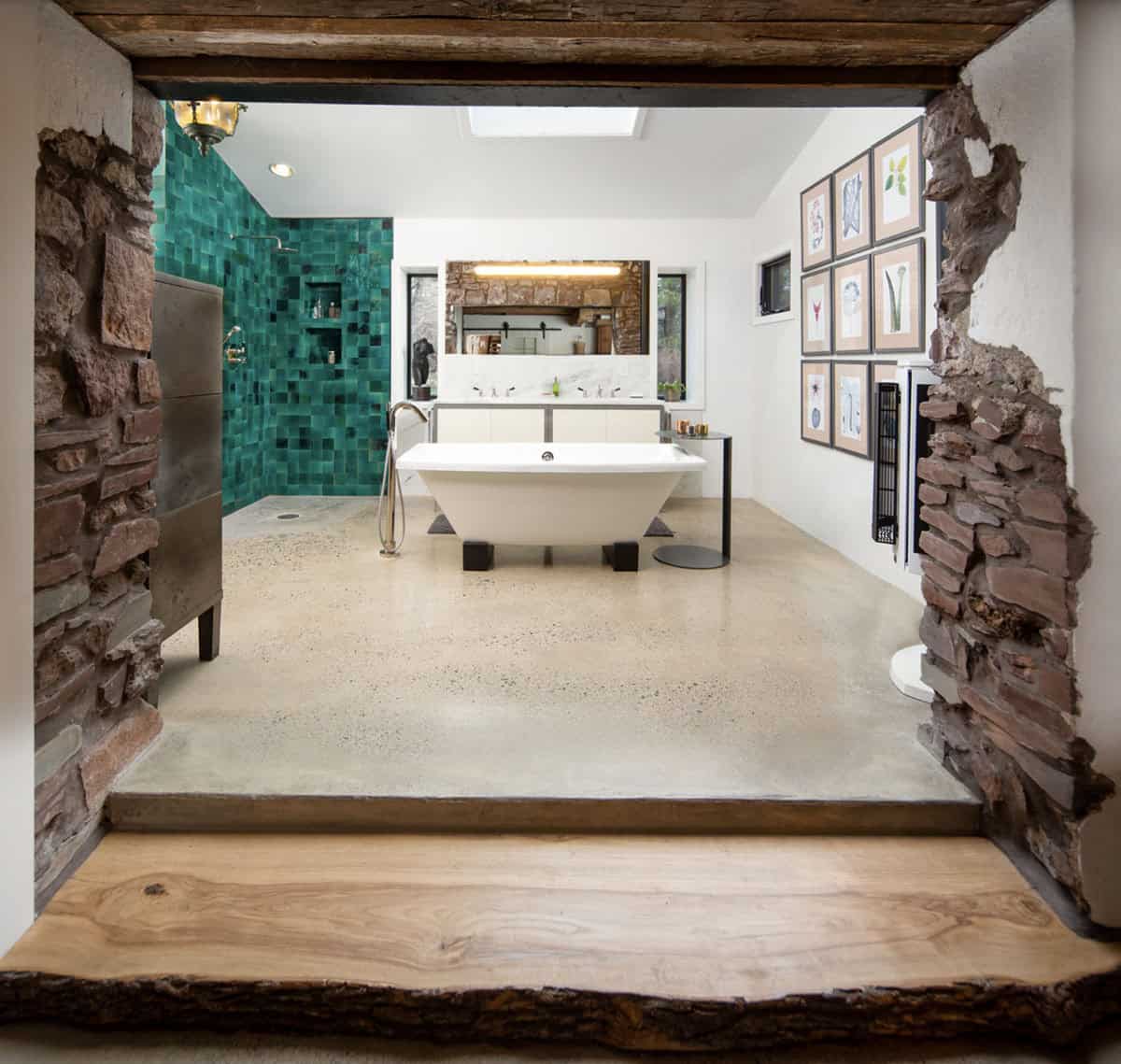 modern barn style bathroom with a freestanding tub