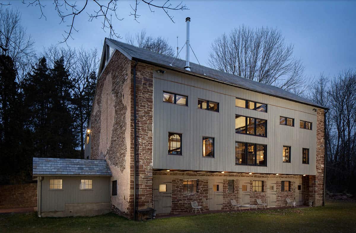 modern barn home exterior at dusk