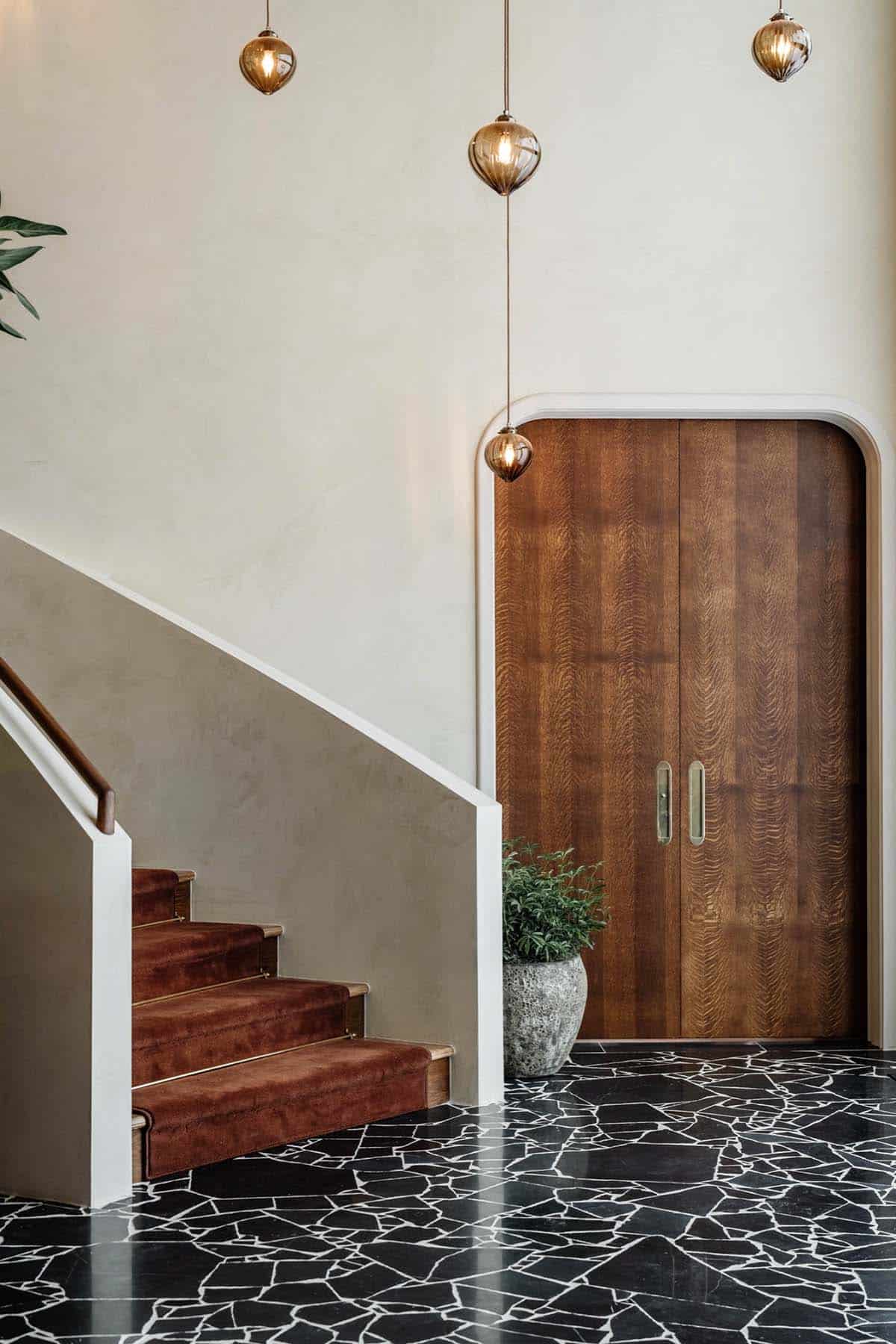 modern home entry with a staircase