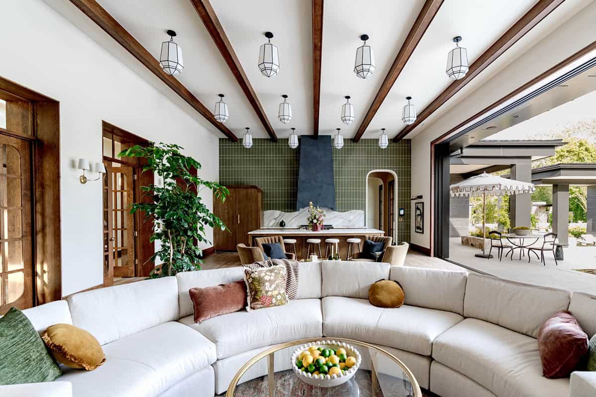 modern outdoor living room with a view of the outdoor kitchen