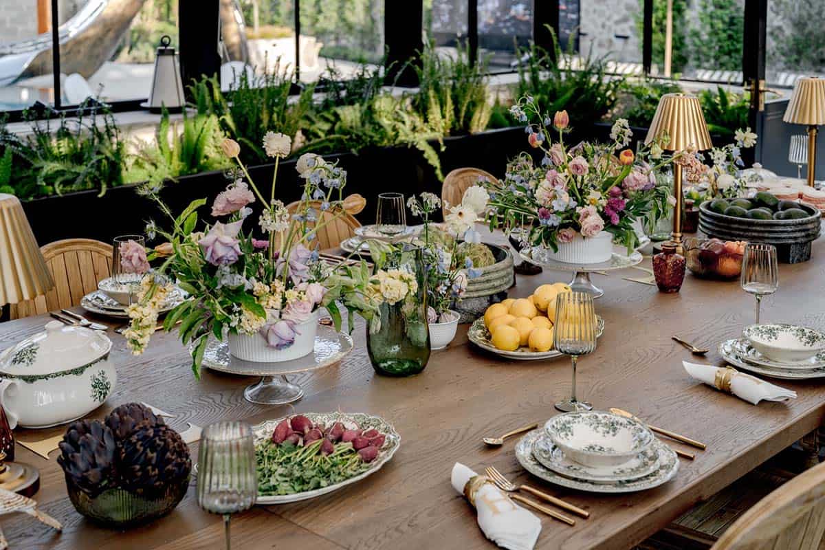 modern glass pavillion with a dining table