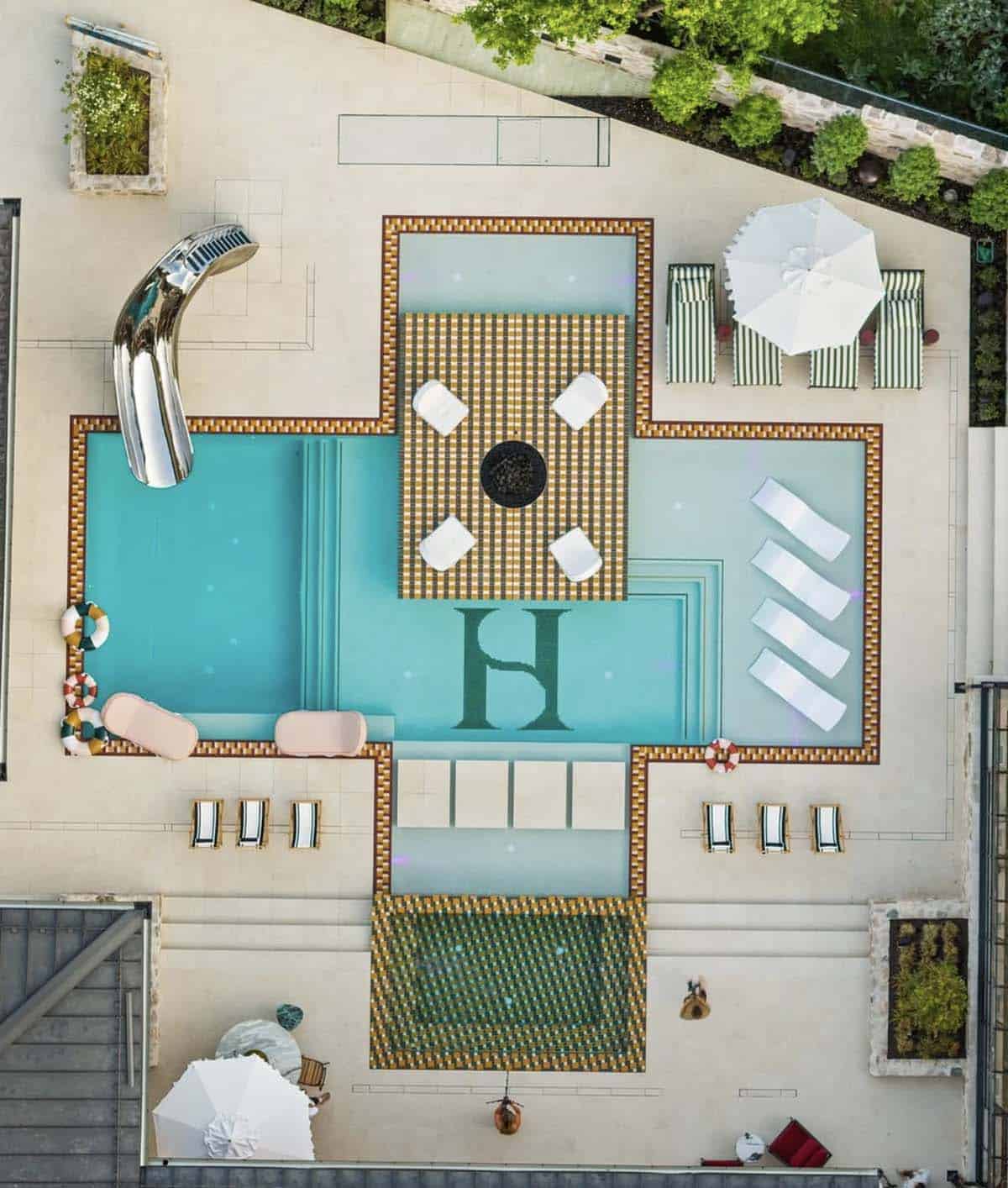 modern home exterior pool aerial view