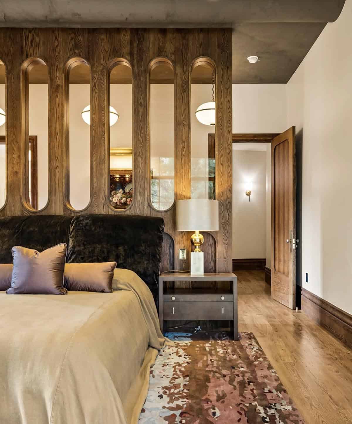 modern bedroom with a custom headboard