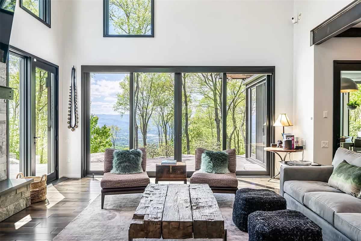 modern living room with sliding glass walls